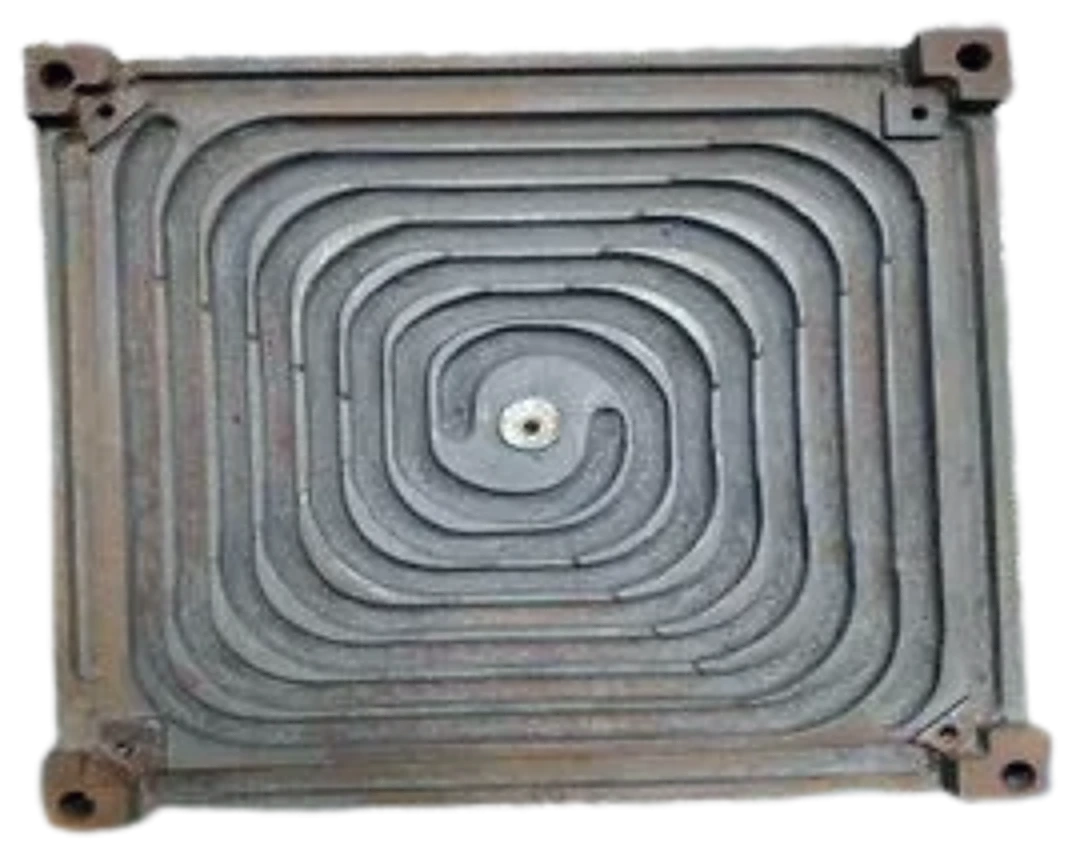Open coil furnace heating element wound in a flat spiral inside a cast frame